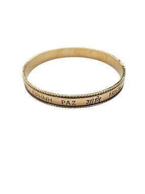 Avon Embossed Peace In Various Languages  Gold Tone Bangle Bracelet J553